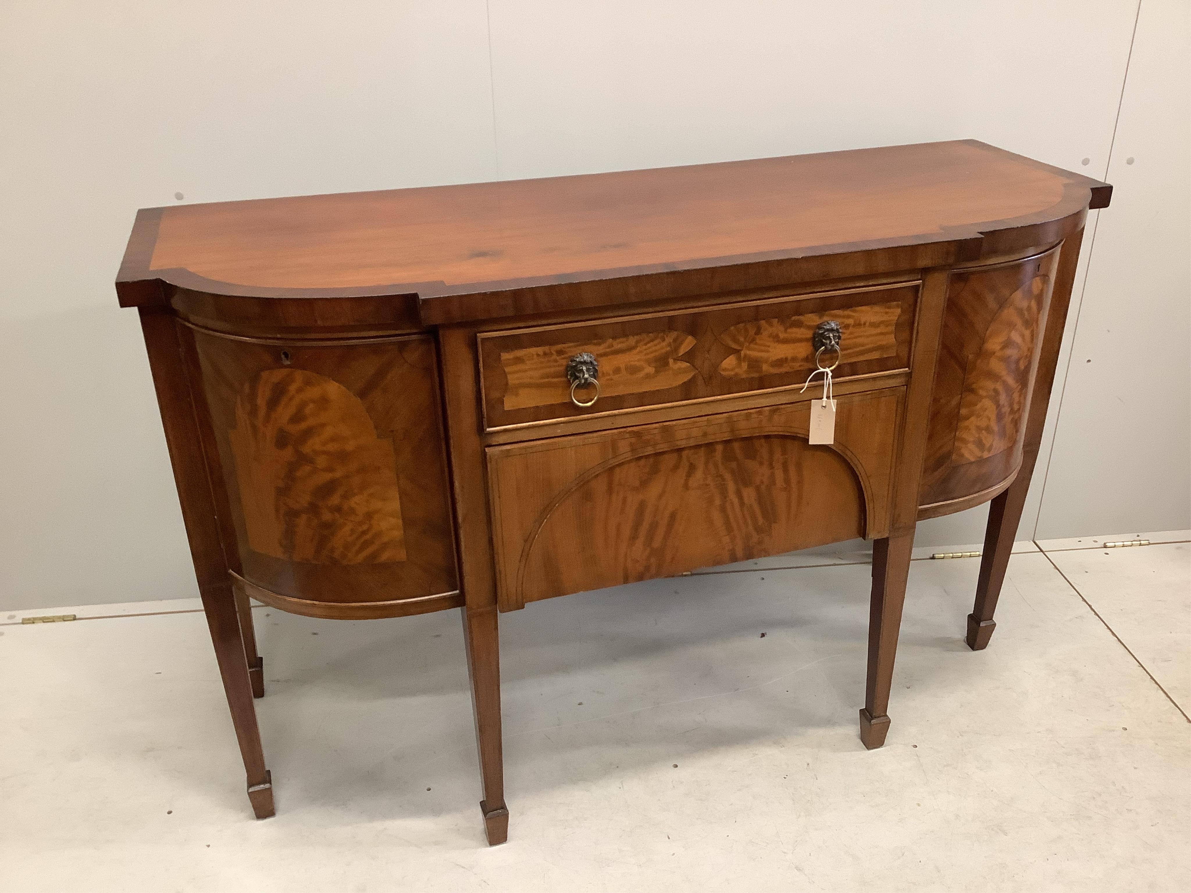 A George IV mahogany bow front sideboard, width 150cm, depth 57cm, height 95cm. Condition - poor to fair